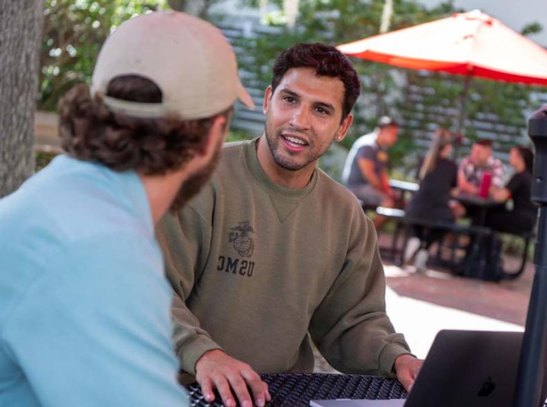 Transfer students talking at lunch